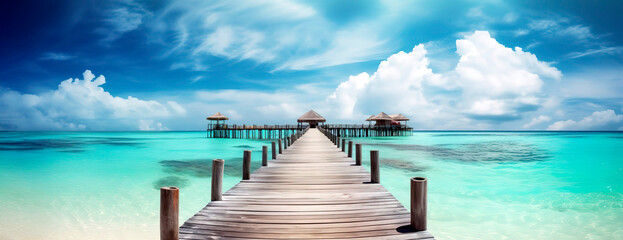 Fototapeta premium Pier in a tropical island paradise in beautiful clear water.
