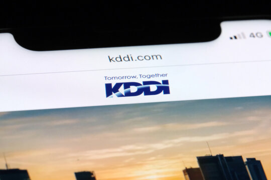 Shanghai,China-April 12th 2023: close up KDDI Corporation brand logo on official website. Japanese telecommunications operator