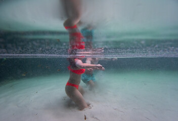 Couple enjoying the underwater experience of Jalapao's fervedouro