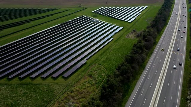 Solar power station in the field near a highway, Trnava, Slovakia, 4k