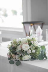 Bouquet of flowers on the banquet table 
