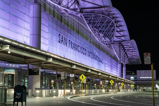 Facade of San Francisco International Airport T3 entrance  at night, side view