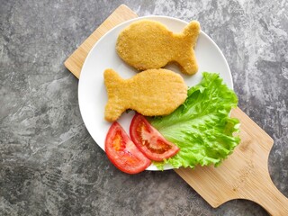 fish shaped cutlets, fish cakes, copy space