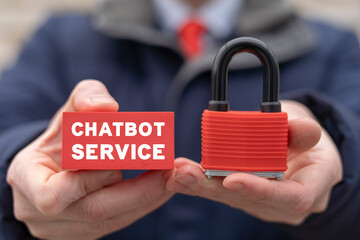 Businessman holding red padlock and styrofoam block with inscription: CHATBOT SERVICE. Artificial intelligence chatbot assistance. Online chat bot support customer service.
