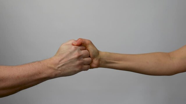 Modern handshake of a man and woman