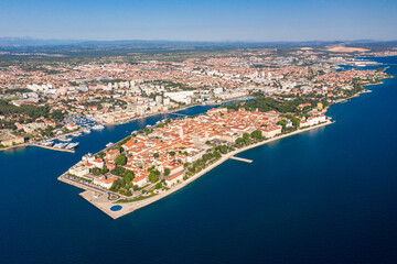 Aerial shot of Zadar old town, famous tourist attraction in Croatia. Waterfront aerial summer view, Dalmatia region of Croatia.