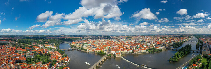 Fototapeta na wymiar Prague Old Town in Czech Republic with Famous Sightseeing Places in Background. Charles Bridge Iconic 14th century Structure with View, Vltava river and Prague Cityscape. Must Visit City