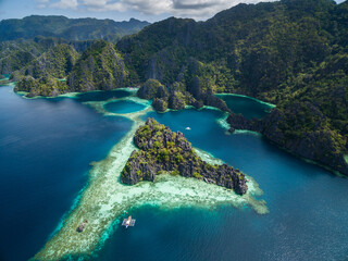 Twin Lagoon in Coron, Palawan, Philippines. Mountain and Sea. Lonely Boat. Tour A.