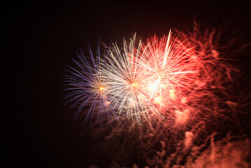 Colorful firework with bokeh background. New Year celebration, Abstract holiday background. Fireworks at Night. Abstract background for celebration