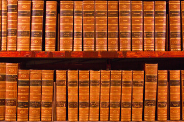 row of old books in a library