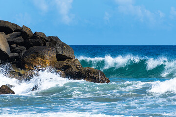 waves crashing on rocks