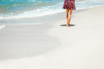 A Feet and footprints by the seashore in nature travel vacation background