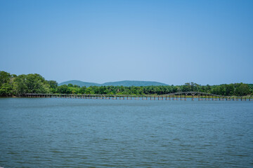
Reservoir views with wooden bridges, forests and mountains