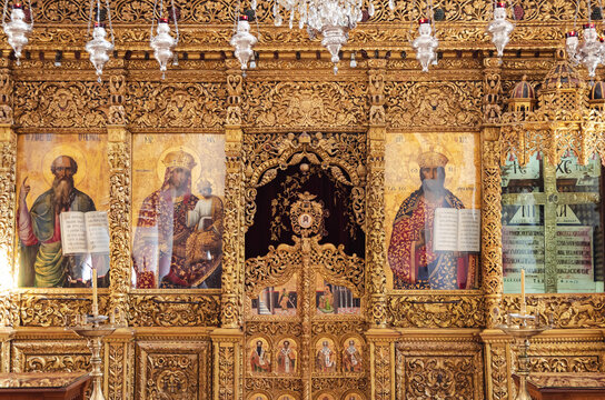 Omodos, Cyprus - September 28, 2022: Iconostasis and Royal Doors in Holy Cross Church and Monastery in Omodos village