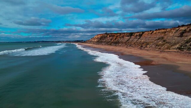 Aerial drone establishing shot of Hengistbury Head Beach,Dorset