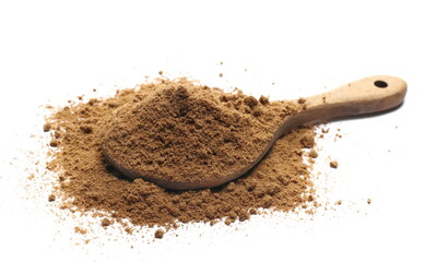 Coriander powder in wooden spoon isolated on white, side view