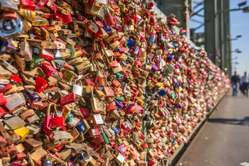 Bridge View Cologne where people express their love padlocks hanging on the fences of protection. These locks generate an incredible texture of colors and shapes