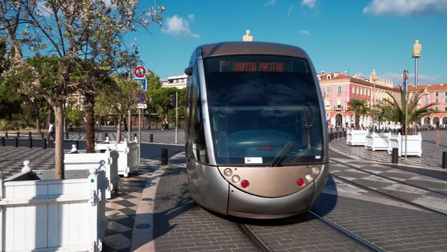 City tram turns from the Place Massena square to the Boulevard Jean Jaures in Nice, France