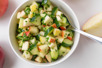 Cucumber Apple salad marinated with honey, lemon juice, oilive oil and parsley