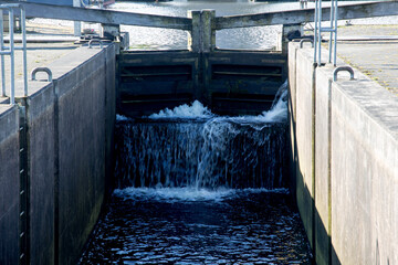 Rushing Water at a Rural Canal Lock Gate