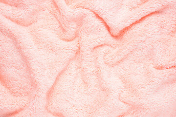 soft pink texture of bath towel folded, background