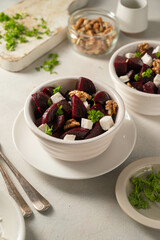 Beetroot salad with feta cheese and walnuts, top view