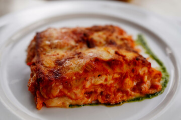 food, meal, cheese, plate, dinner, meat, italian, lasagna, pizza, dish, cuisine, baked, lasagne, pasta, tomato, egg, lunch, beef, sauce, vegetable, cooked, white, closeup, fried, snack