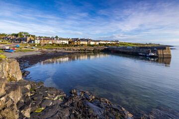 The small fishing village of Craster, with its picturesque harbour, on the coast of Northumberland, England