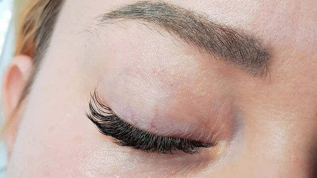 close up of eye with eyelash extensions ,beauty salon treatment