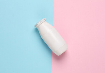White bottle of yogurt on Top view background. Top view