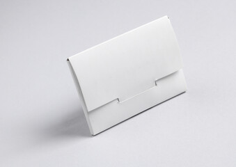 White box for new bank card on a gray background
