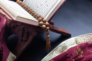 Koran Holy Book of Muslims on dark black background
