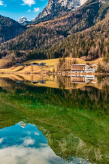 Alpine winter view with reflections and Mount Reiteralpe in the background at Lake Hintersee, Ramsau, Berchtesgaden, Bavaria, Germany