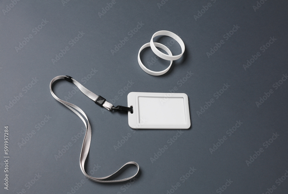 Wall mural Blank id cards on belt and silicone belts, gray background. Template for design. - Wall murals