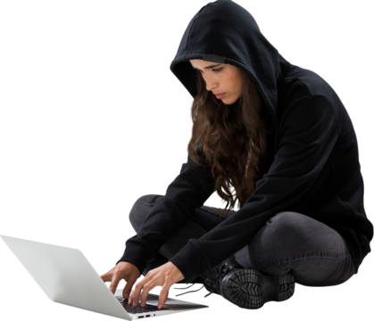 Female hacker using laptop