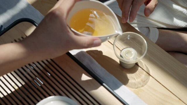 Happy mature couple drinking tea in tea room,4K - Powered by Adobe