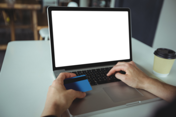 Woman making payment online using laptop