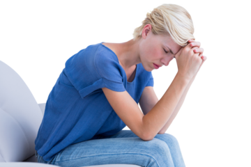 Depressed woman sitting on couch