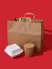 Takeaway food packaging: boxes and containers on colorful background with text space. Minimalistic concept
