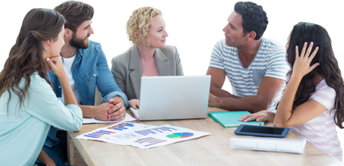 Colleagues using laptop at office