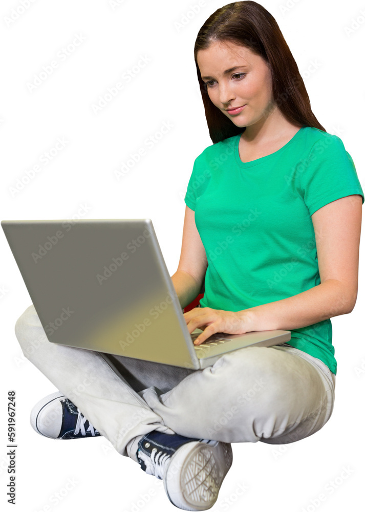 Poster student sitting on floor in library using laptop