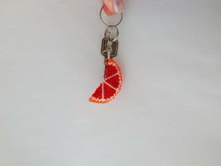 Colorful bead key chain on a white background