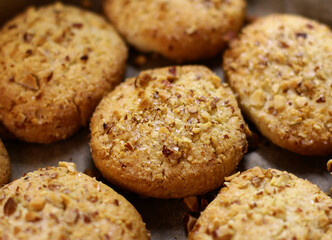 nut homemade cookies with almonds. Delicious sweet snack. food background, cookie texture close-up.