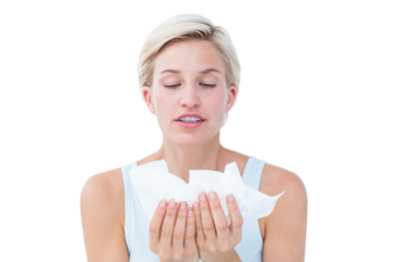 Sick woman holding tissues