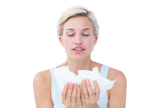 Sick woman holding tissues