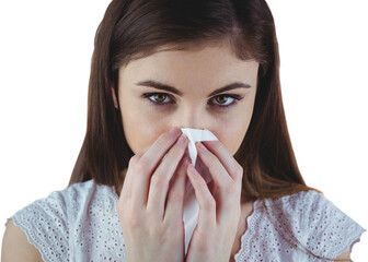 Portrait of sick woman blowing nose