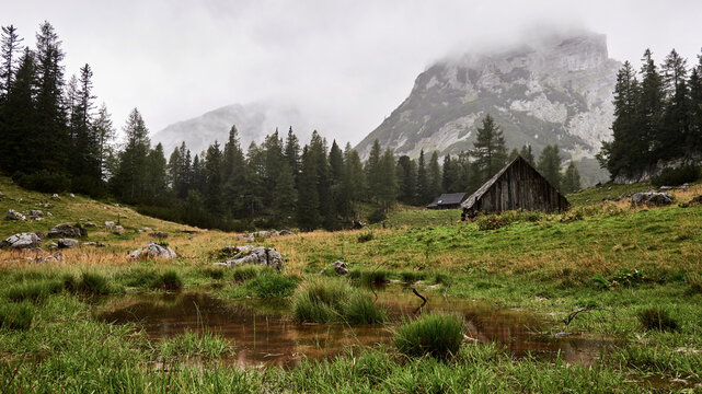landscape with alpine hut in the mountains on a rainy mood day Ges&auml;use Austria