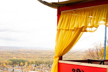 outdoor chinese style wooden gazebo with yellow curtains, beautiful restaurant with a gazebo and...