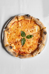 Margherita pizza, served in Italian restaurant