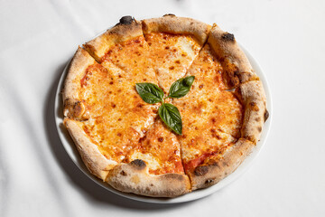 Margherita pizza, served in Italian restaurant